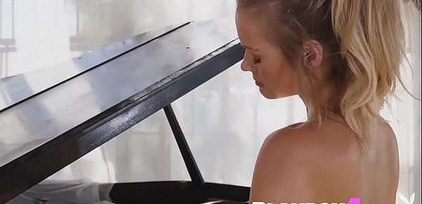  Beautiful blonde MILF playing a piano totally naked